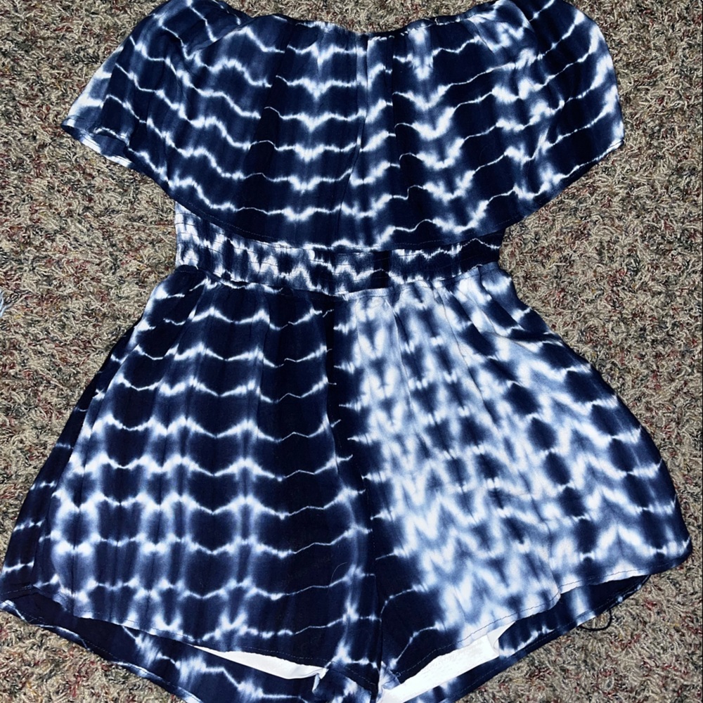 T.C. Elli’s wavy blue and white romper. Size: S/M. Never worn